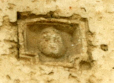 Carved face in Cabrales